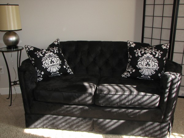 Re-Upholstered Black Loveseat